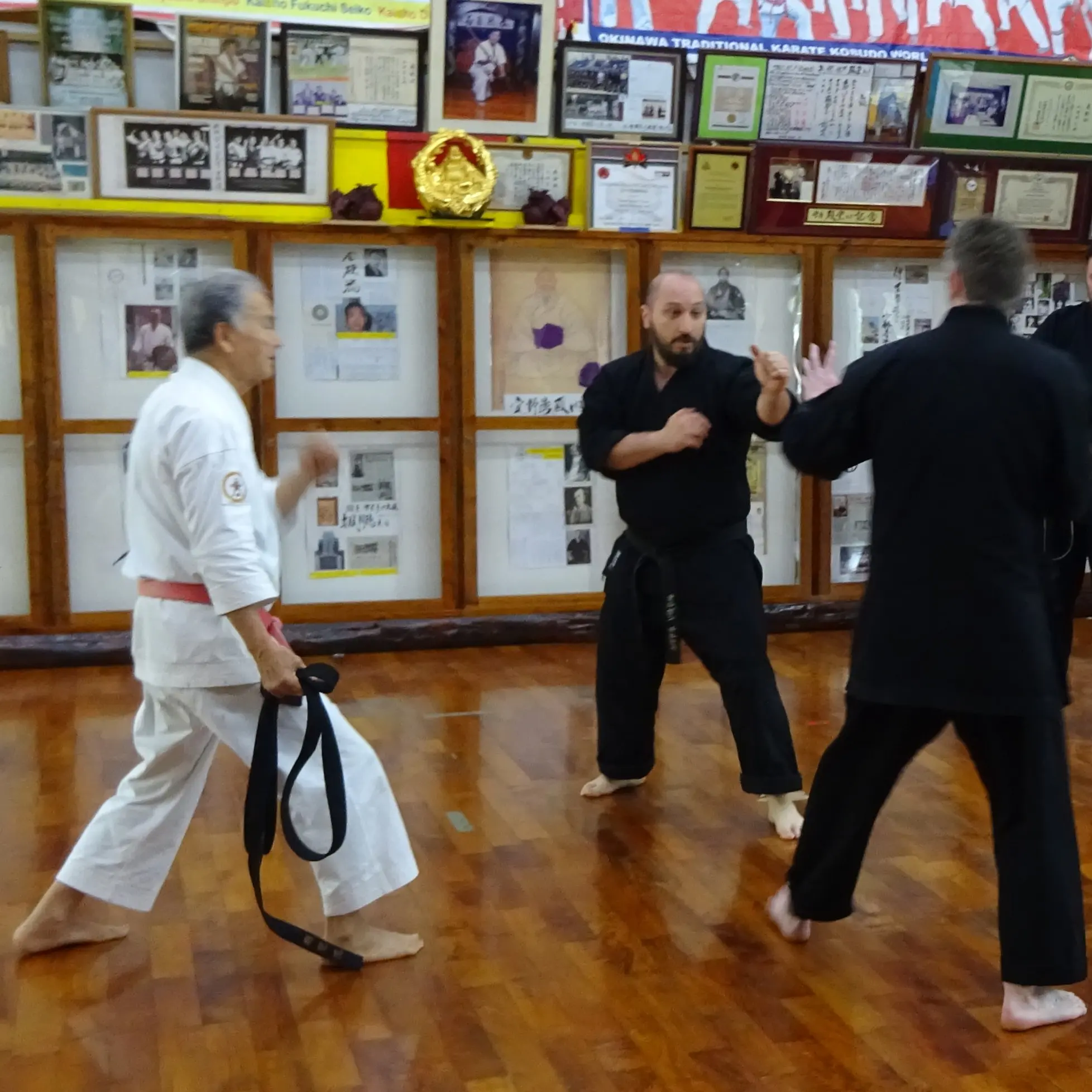 Olgun Tiltay studying kumite [sparring] in Okinawa from Tetsuhiro Hokama Sensei [10th Dan] Gojuryu Karate